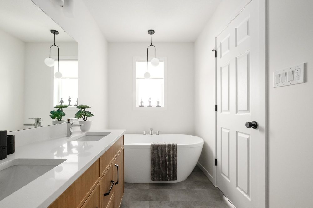 Ensuite with freestanding soaker tub in a Crawford Homes show home